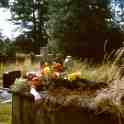 John Simpson on a grave at Church Wilne